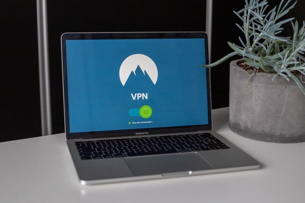 A laptop displaying a VPN application to get a Virtual IP Address