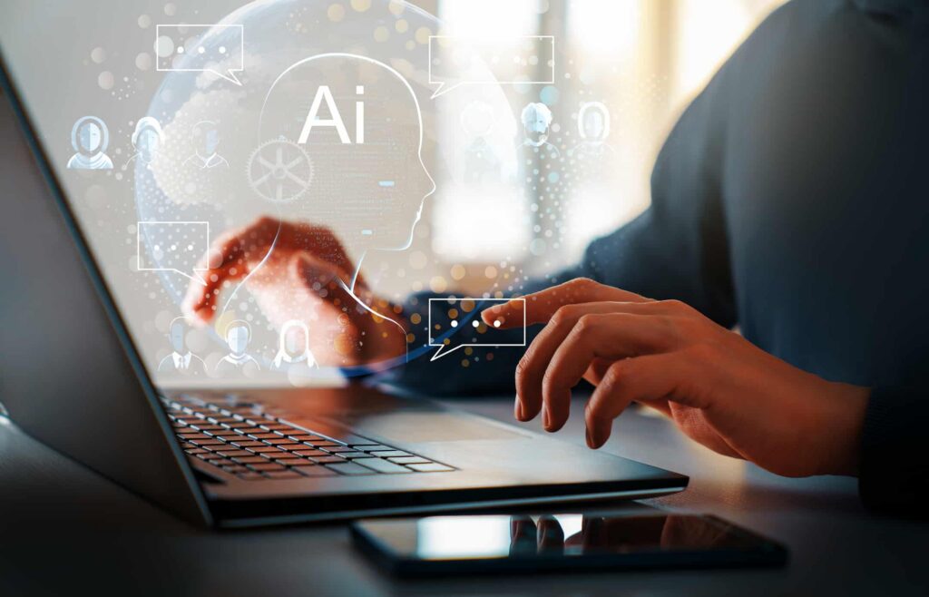 Person typing a conversation with an AI companion on a laptop