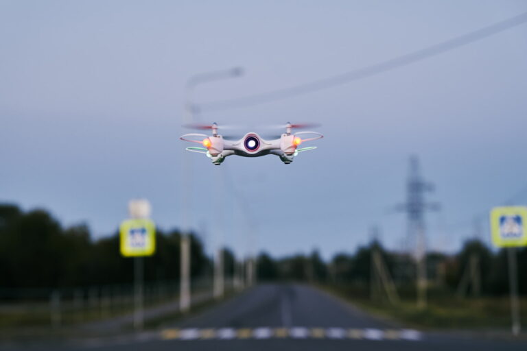 Aerial surveillance technology mapping streets and homes, symbolizing the loss of public anonymity.