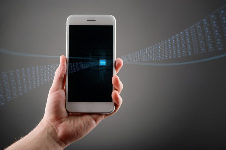 eSIM chip embedded in a smartphone motherboard, replacing the need for a physical SIM card.