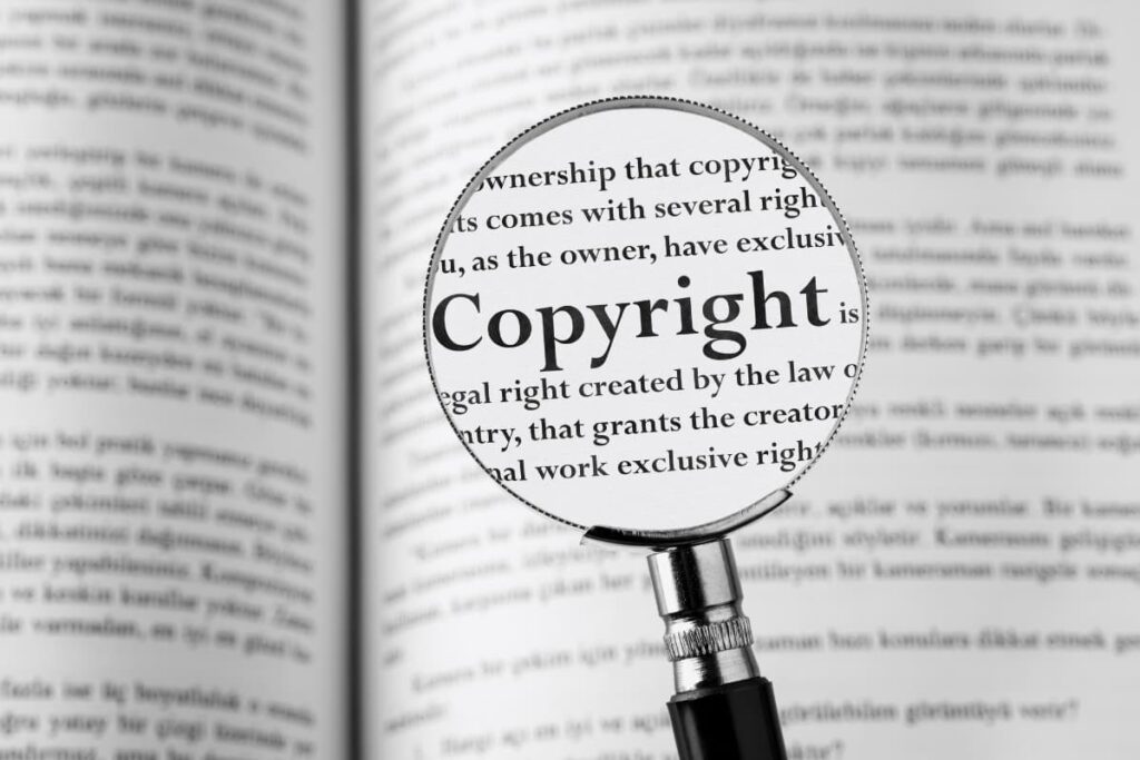 Magnifying glass focusing on the word copyright
