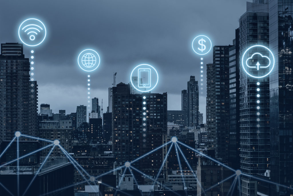 Network technology icons overlaid on a cityscape to suggest connectivity