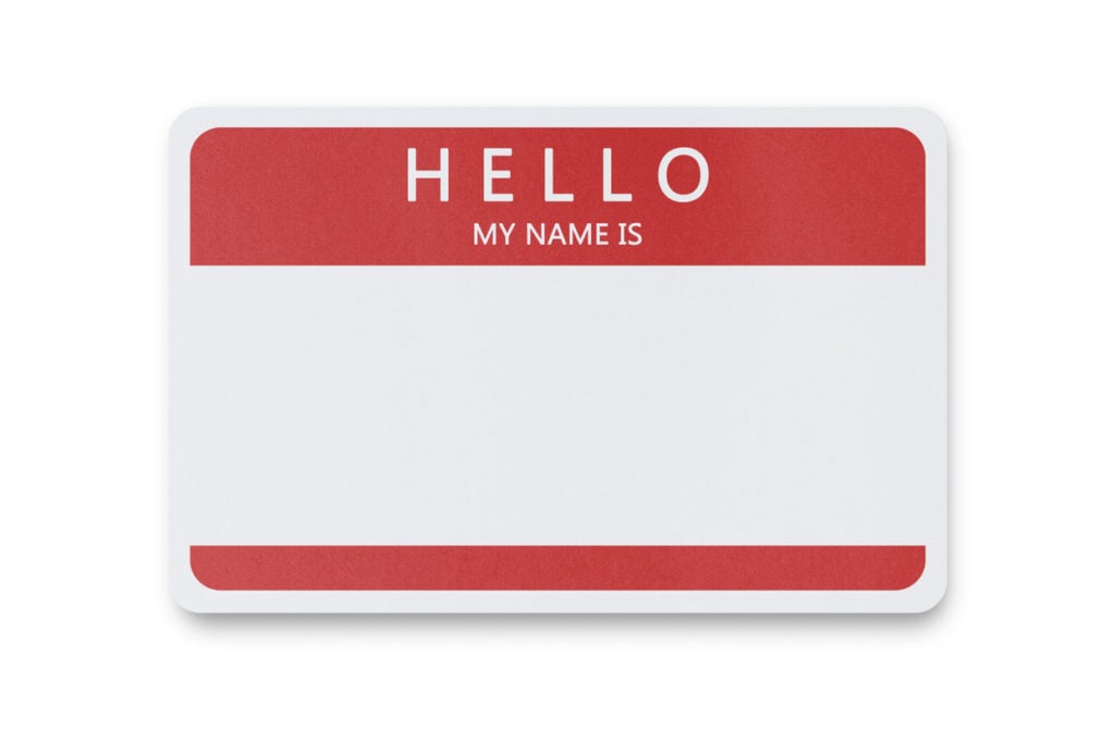Red and white blank name tag on a white background