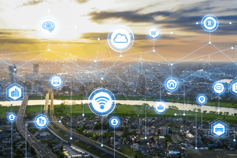 A modern cityscape overlaid with connected smart-city icons, representing IoT networks that manage services like traffic, utilities, and public safety.