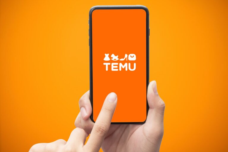 User opening the Temu shopping app on a mobile phone.