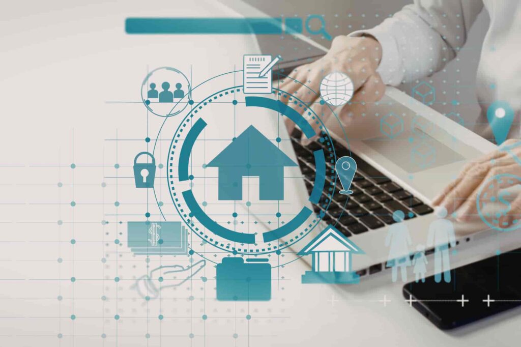 Woman using a laptop to manage smart home devices through a modern home automation system.