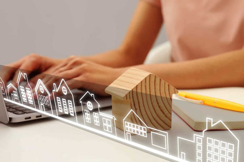 Woman managing financial records and digital accounts while preparing a digital estate plan.